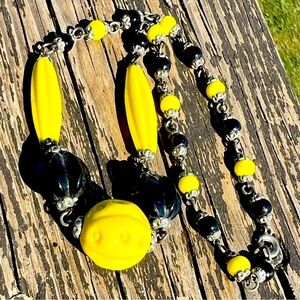 Vintage necklace. A mystery on how old it is Beads have pewter colored caps.